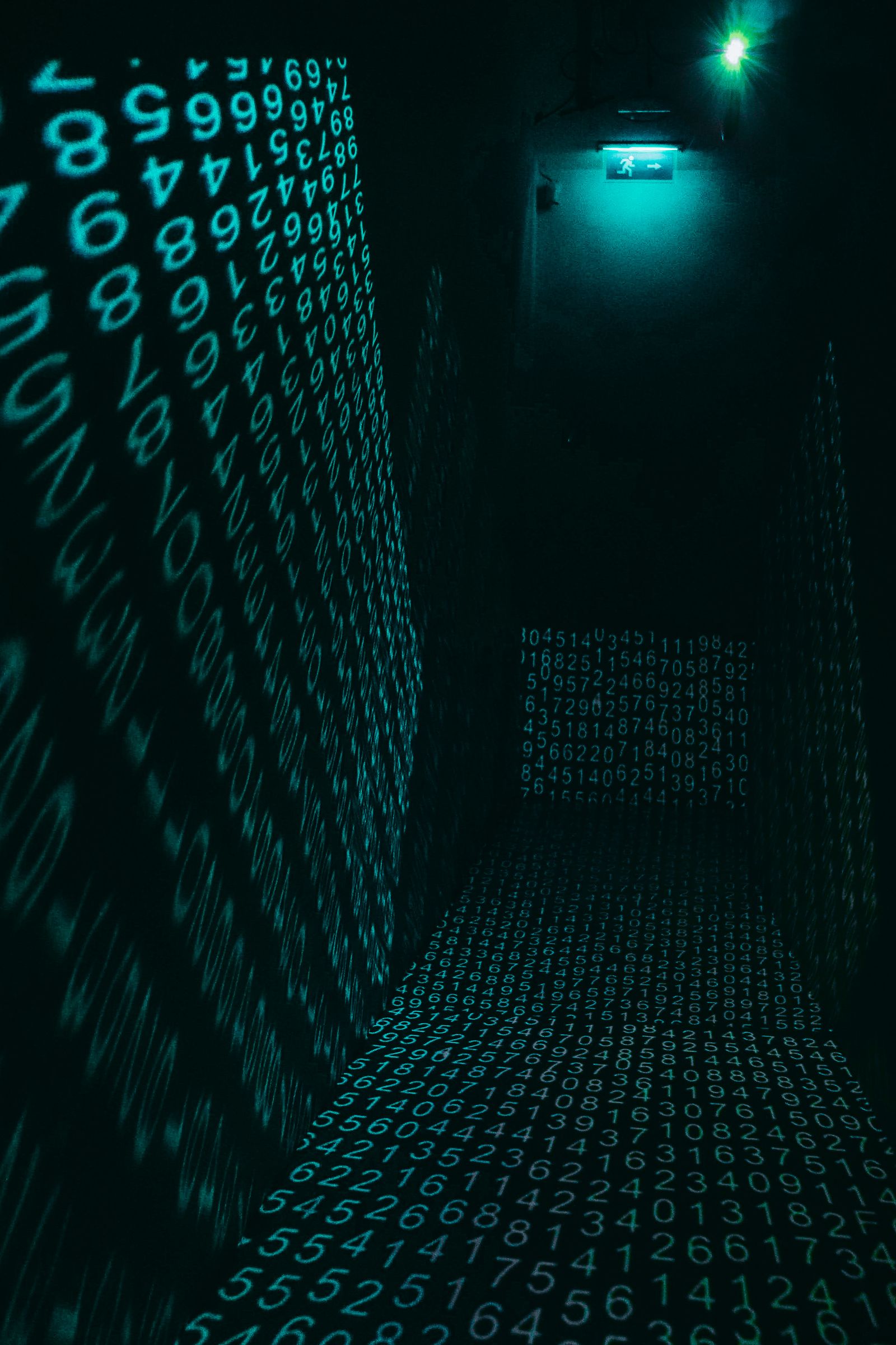 A corridor of glowing digits — a stream of repeatedly downloaded data