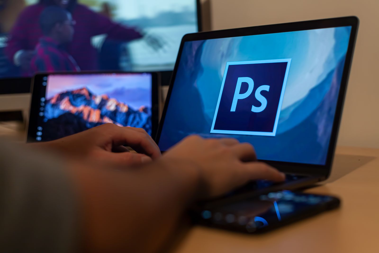 A laptop with a graphics-editor logo — working without installing heavy software